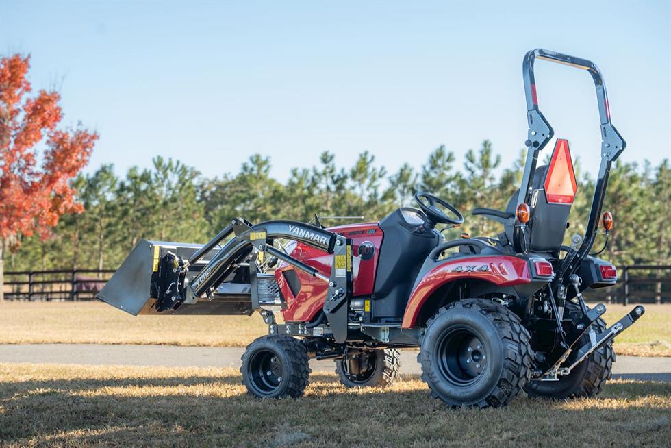 SA223 KURO side view with loader bucket installed and roll bar up