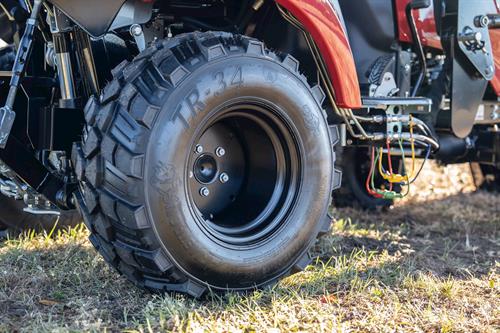 closeup view of SA223 KURO tires and black wheels